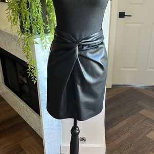 Nanushka black twist front faux leather skirt